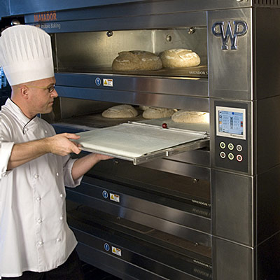 Ciril Hitz Loading Bread into the Matador Store Oven