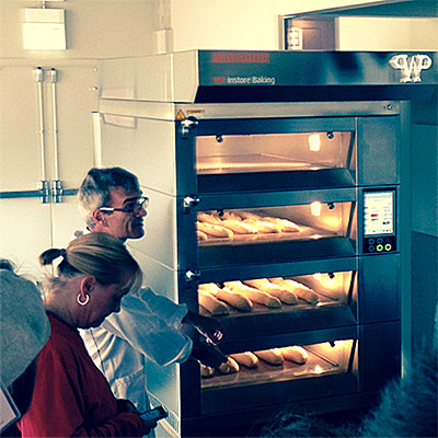 Chefs Hubert Chiron and James MacGuire remove baguettes from our Matador Store Instore Baking Oven at Wheatstalk 2014 in Chicago.