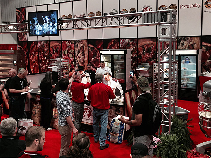 World Pizza Cup Champion Tony Gemignani using WP Bakery Group USA's Matador Store Electric Stone Hearth Deck Oven at the Pizza Expo 2015.