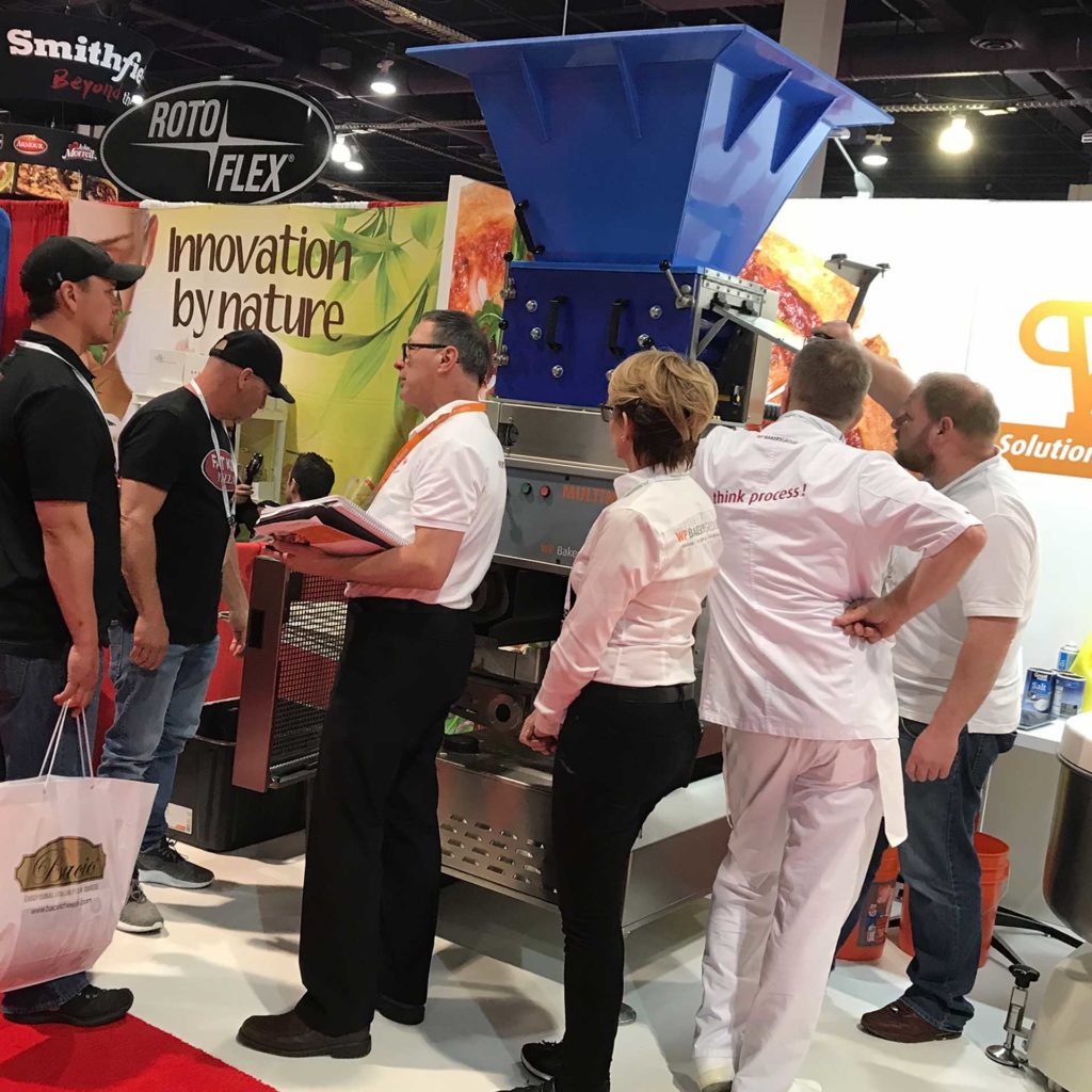 WP Bakery Group USA demos the Multimatic S Dough Divider and Rounder at the Pizza Expo 2018 in Las Vegas, NV.